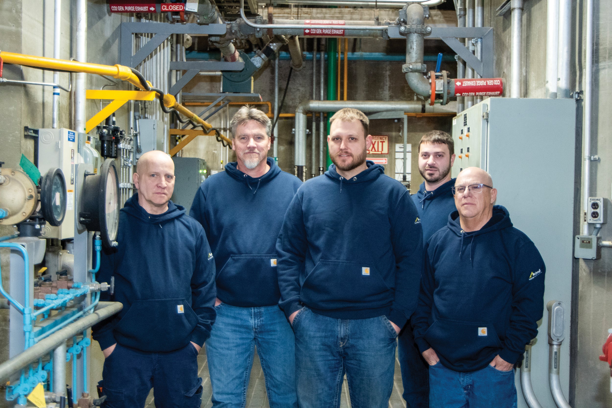 Current Raystown Hydroelectric Plant staffers Victor Jackson and Eric Reed, operations and maintenance technicians; Clay Harshbarger, plant superintendent; Charles Hackenberry, senior operations and maintenance technician; and David Wagner, operations and maintenance technician.