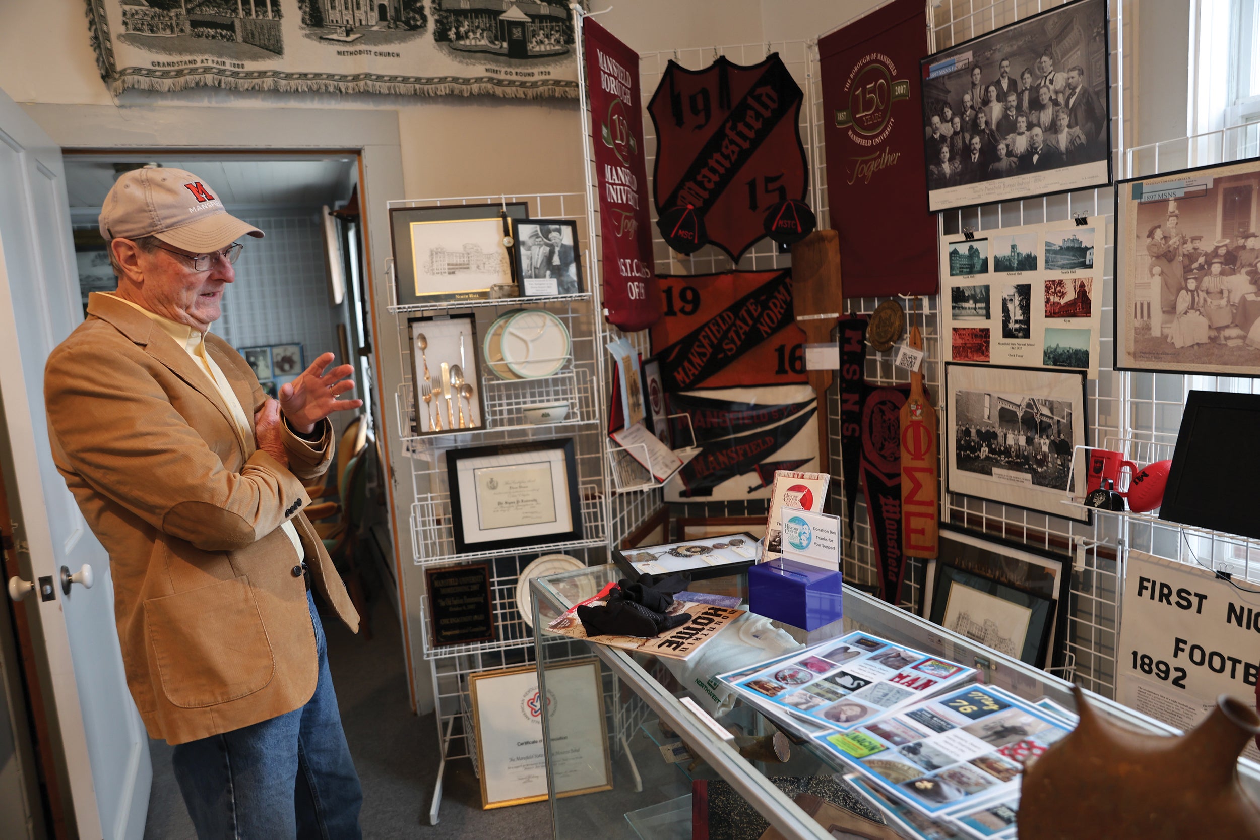 Steve McCloskey, known as “Mr. Mansfield,” reflects on the community — one of many along Route 6 —  and its accomplishments at The History Center on Main Street.